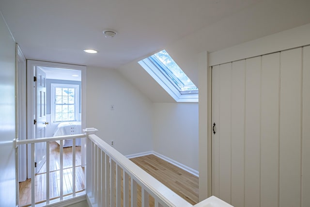 52 Mckinley St, South Portland, ME 04106 - hall with a skylight, light wood-style floors, lofted ceiling, and recessed lighting
