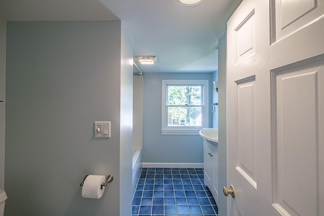 52 Mckinley St, South Portland, ME 04106 - bathroom featuring vanity, tile patterned flooring, and a bathtub