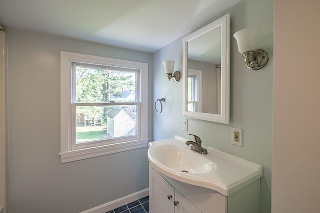 52 Mckinley St, South Portland, ME 04106 - bathroom featuring vanity, plenty of natural light, and tile patterned floors