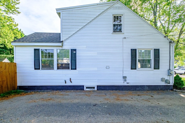52 Mckinley St, South Portland, ME 04106 - view of side of home with a shingled roof