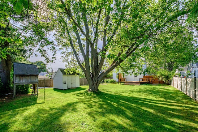 52 Mckinley St, South Portland, ME 04106 - fenced backyard featuring a storage shed and a wooden deck