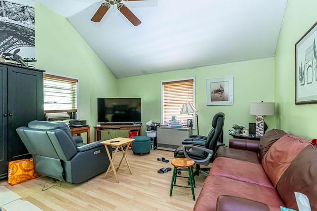 37 Paul St, York, ME 03909 - living area featuring wood finished floors, healthy amount of natural light, a ceiling fan, lofted ceiling, and a desk