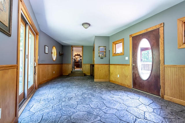37 Paul St, York, ME 03909 - foyer with a wainscoted wall and wood walls