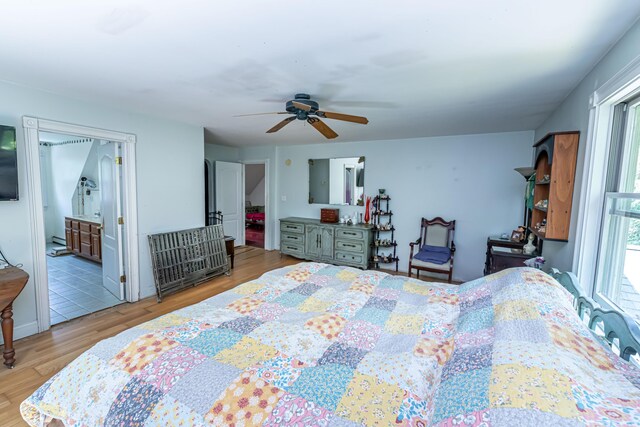 37 Paul St, York, ME 03909 - bedroom with wood finished floors, a ceiling fan, and connected bathroom