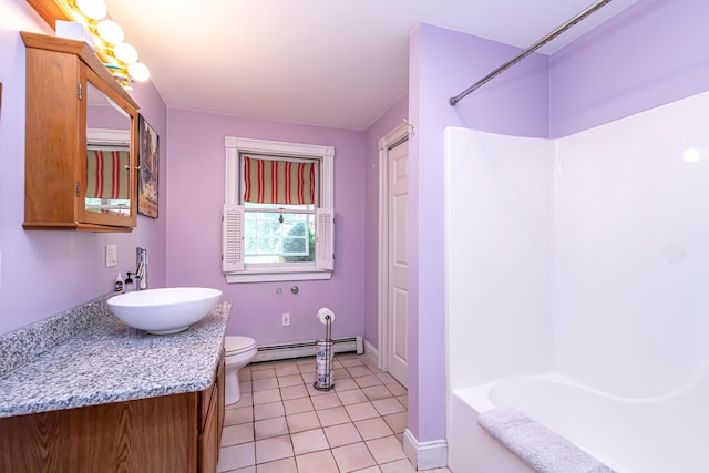 37 Paul St, York, ME 03909 - bathroom with vanity, a baseboard heating unit, shower / tub combination, and tile patterned flooring