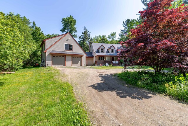 37 Paul St, York, ME 03909 - view of front of property with dirt driveway and a front lawn