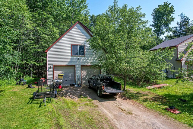 37 Paul St, York, ME 03909 - view of front of property featuring driveway and a front yard