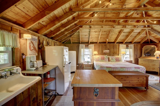 23 E Grand Ave, Scarborough, ME 04074 - bedroom featuring wood ceiling, freestanding refrigerator, dark wood-type flooring, and wooden walls