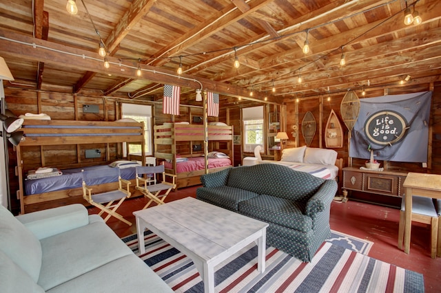 23 E Grand Ave, Scarborough, ME 04074 - bedroom with a wooden ceiling with exposed beams, wood finished floors, and wooden walls