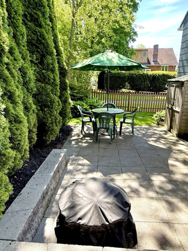 82 Park Ave, Old Orchard Beach, ME 04064 - view of patio featuring outdoor dining space and grilling area