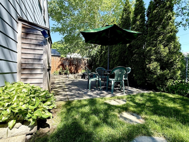 82 Park Ave, Old Orchard Beach, ME 04064 - view of yard featuring a patio area
