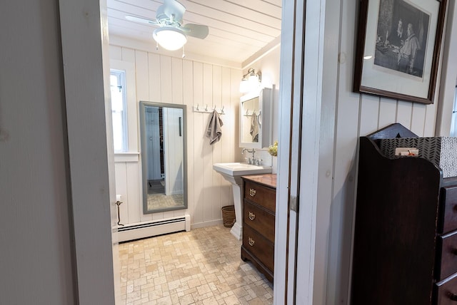82 Park Ave, Old Orchard Beach, ME 04064 - bathroom with baseboard heating, ceiling fan, and vanity