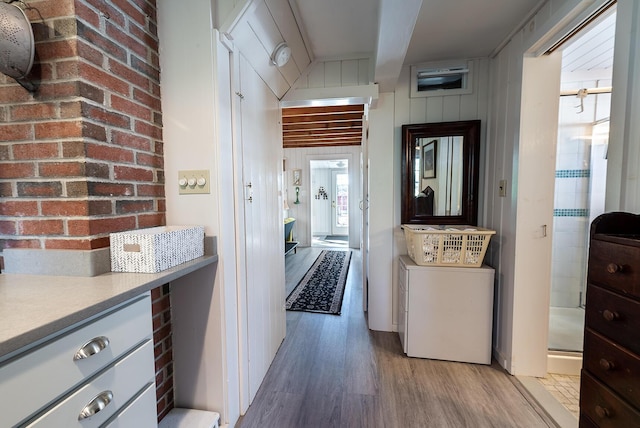 82 Park Ave, Old Orchard Beach, ME 04064 - hallway featuring light wood-style flooring and beamed ceiling