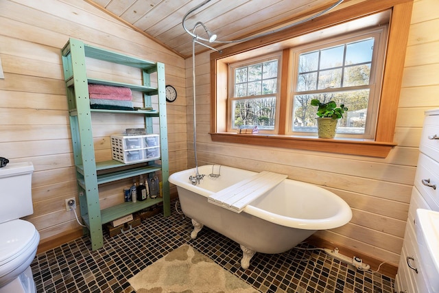 82 Park Ave, Old Orchard Beach, ME 04064 - full bath featuring wooden walls, vaulted ceiling, wooden ceiling, and a freestanding tub