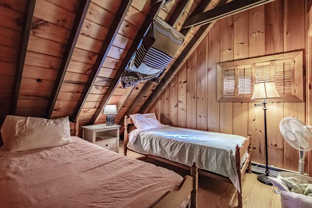 34 Alpine Shores Rd, Woodstock, ME 04219 - bedroom featuring wood finished floors and wood walls