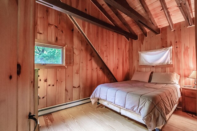 34 Alpine Shores Rd, Woodstock, ME 04219 - bedroom with baseboard heating, wood finished floors, wooden walls, and wood ceiling