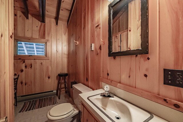 34 Alpine Shores Rd, Woodstock, ME 04219 - half bathroom with a baseboard heating unit, vanity, and wooden walls