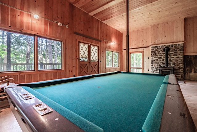34 Alpine Shores Rd, Woodstock, ME 04219 - playroom featuring wooden walls, a wood stove, wood ceiling, pool table, and vaulted ceiling