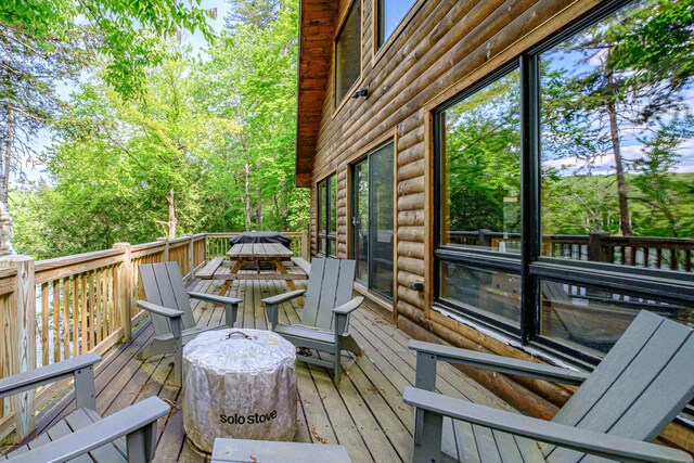 34 Alpine Shores Rd, Woodstock, ME 04219 - wooden terrace featuring outdoor dining space