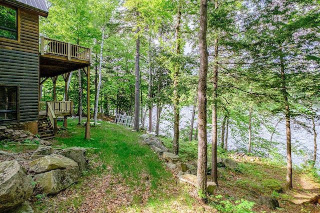 34 Alpine Shores Rd, Woodstock, ME 04219 - view of yard featuring a deck with water view and stairs
