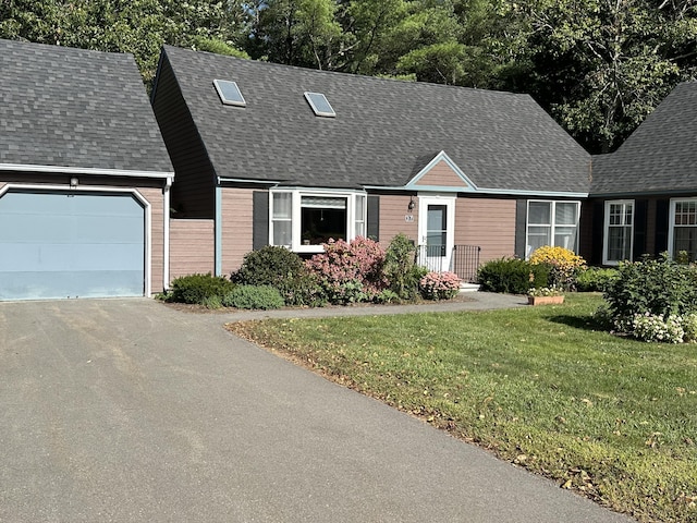 37 Cortland Cir Unit 37, Bangor, ME 04401 - cape cod house featuring roof with shingles, a front yard, asphalt driveway, and an attached garage