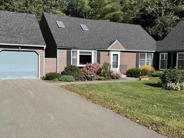 37 Cortland Cir Unit 37, Bangor, ME 04401 - cape cod house featuring roof with shingles, a front yard, asphalt driveway, and an attached garage
