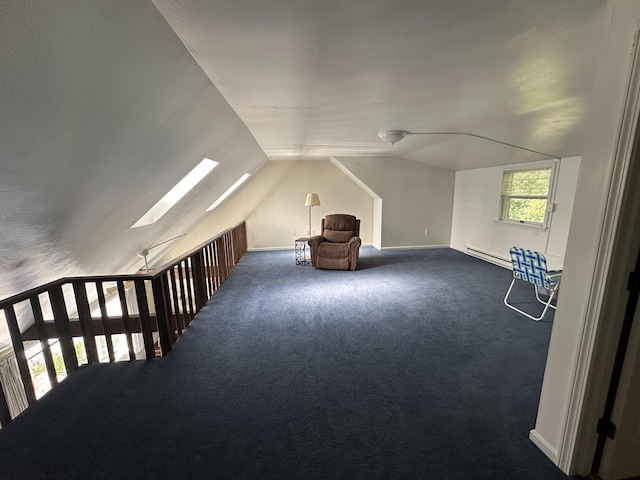 37 Cortland Cir Unit 37, Bangor, ME 04401 - bonus room with vaulted ceiling, carpet, a skylight, and a baseboard heating unit