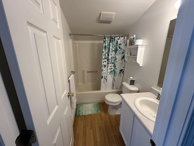 37 Cortland Cir Unit 37, Bangor, ME 04401 - bathroom featuring wood finished floors, vanity, and shower / tub combo