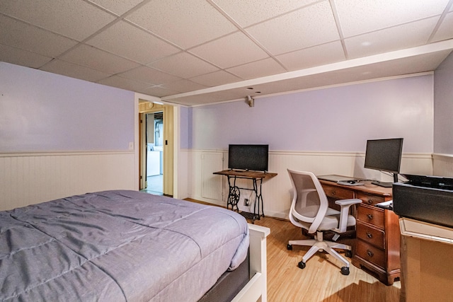 11 Dana Ave, Auburn, ME 04210 - bedroom featuring wainscoting, a drop ceiling, wood finished floors, and a desk