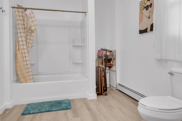 62 Seventh St, Auburn, ME 04210 - bathroom with a baseboard radiator, wood finished floors, and shower / bath combination with curtain
