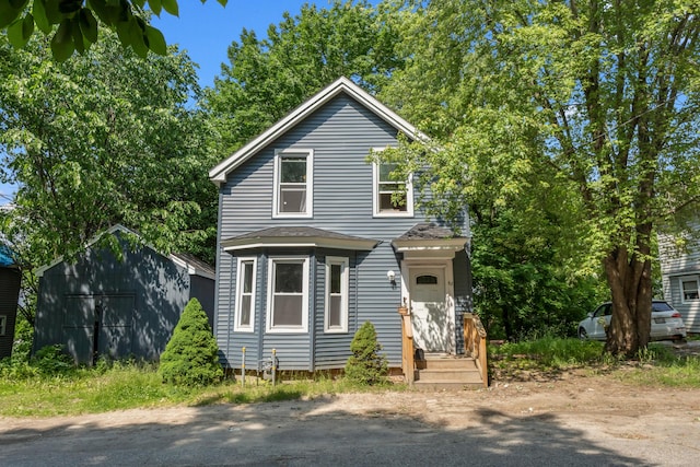 62 Seventh St, Auburn, ME 04210 - view of front facade with an outbuilding