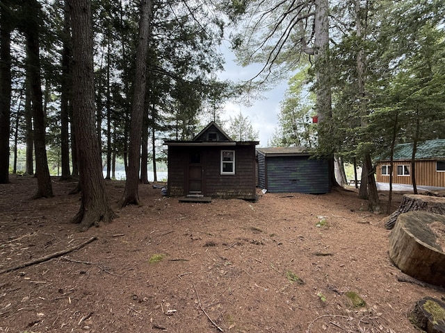 23 Webber Is, Sebec, ME 04481 - view of home's exterior featuring a storage shed