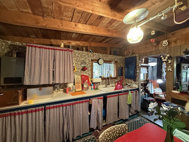 23 Webber Is, Sebec, ME 04481 - kitchen with a wood ceiling with exposed beams and wooden walls