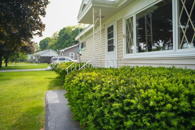 12 Davis Dr, Veazie, ME 04401 - view of side of property featuring a lawn