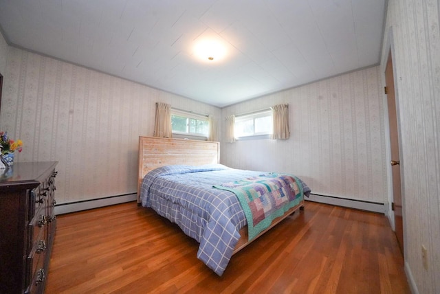 12 Davis Dr, Veazie, ME 04401 - bedroom with a baseboard radiator and wood finished floors