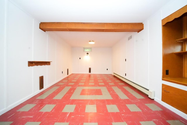 12 Davis Dr, Veazie, ME 04401 - laundry area featuring a baseboard heating unit and tile patterned floors
