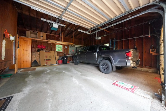 12 Davis Dr, Veazie, ME 04401 - garage featuring a garage door opener