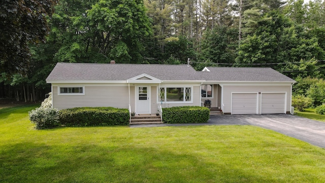 12 Davis Dr, Veazie, ME 04401 - single story home featuring asphalt driveway, a garage, a front yard, a shingled roof, and entry steps