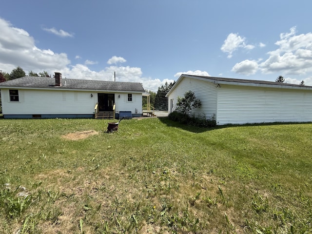 788 Access Hwy, Caribou, ME 04736 - rear view of property featuring a yard and entry steps