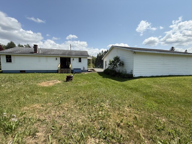 788 Access Hwy, Caribou, ME 04736 - rear view of property featuring a yard and entry steps