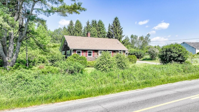 221 Lincolnville Ave, Belfast, ME 04915 - view of front of home featuring a chimney and roof with shingles
