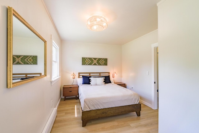 221 Lincolnville Ave, Belfast, ME 04915 - bedroom featuring light wood-style flooring and crown molding