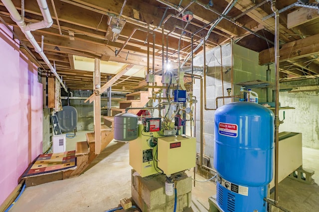 221 Lincolnville Ave, Belfast, ME 04915 - unfinished basement with a water pressure tank and a heating unit