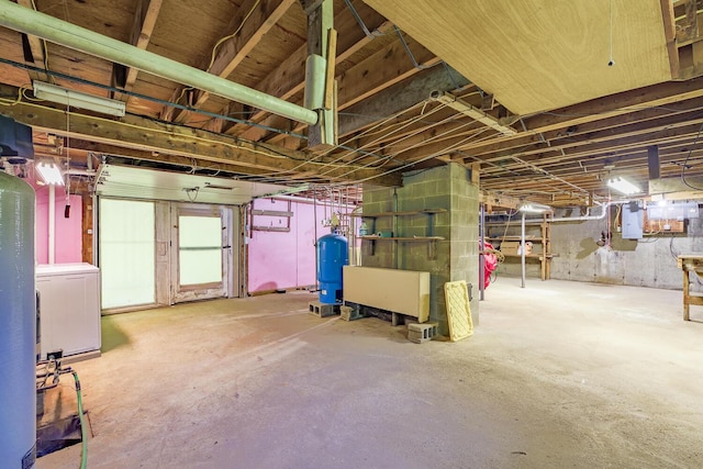 221 Lincolnville Ave, Belfast, ME 04915 - unfinished below grade area featuring washer / clothes dryer, a water pressure tank, and electric panel