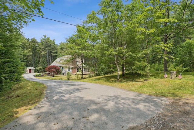 27 Libby Ln, Brunswick, ME 04011 - view of asphalt driveway with a forest view
