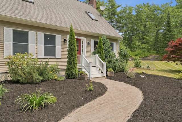 27 Libby Ln, Brunswick, ME 04011 - entrance to property featuring a shingled roof and a chimney
