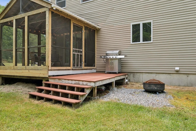 27 Libby Ln, Brunswick, ME 04011 - wooden terrace featuring grilling area, a sunroom, and an outdoor fire pit