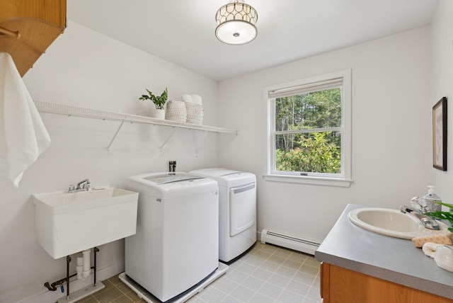27 Libby Ln, Brunswick, ME 04011 - laundry area featuring a baseboard heating unit and washing machine and dryer