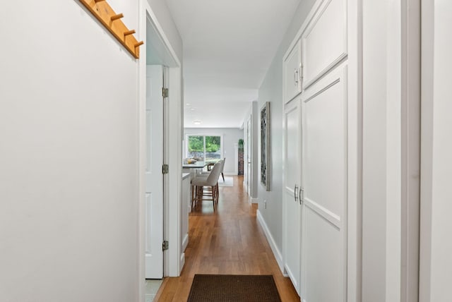 27 Libby Ln, Brunswick, ME 04011 - hallway featuring light wood finished floors and baseboards