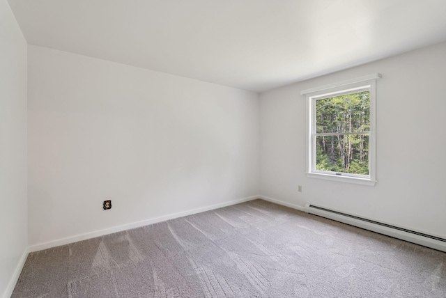 27 Libby Ln, Brunswick, ME 04011 - carpeted spare room featuring baseboards and a baseboard heating unit